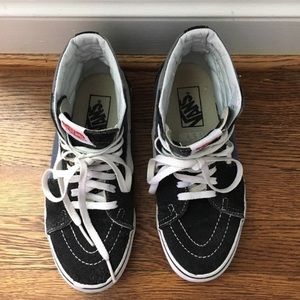 Black, white and navy blue vans. Women’s size 7.